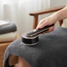 Električni odstranjevalnik dlak in kosmov / Črn